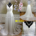 So beautiful chiffon and lace V-neckline wedding dress with a long train and backless